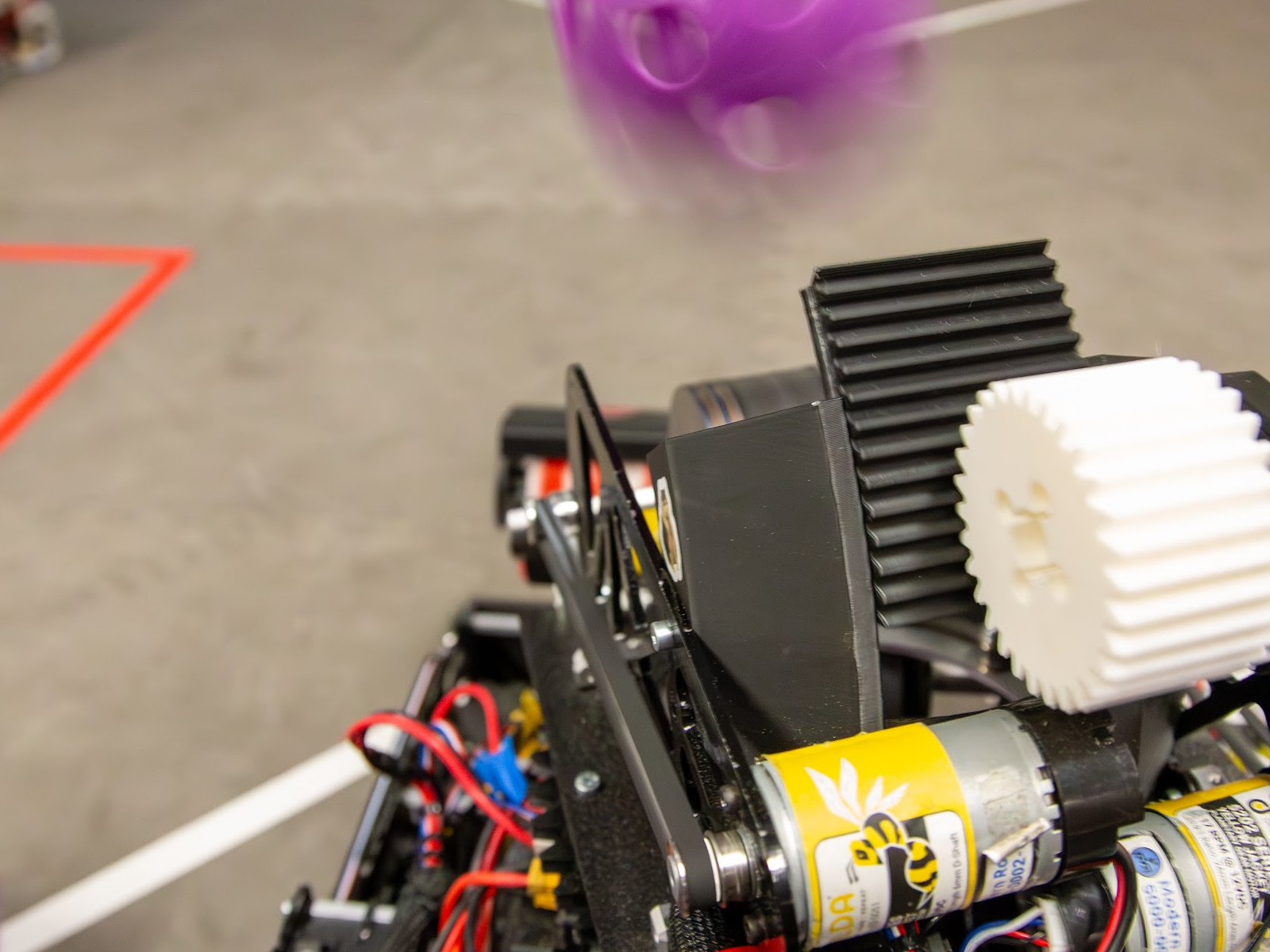 Close-up of the final robot's shooter turret, servo, and modular gears