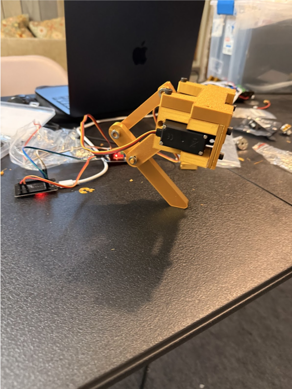 Gold 3D-printed prototype of one two-joint robot dog leg